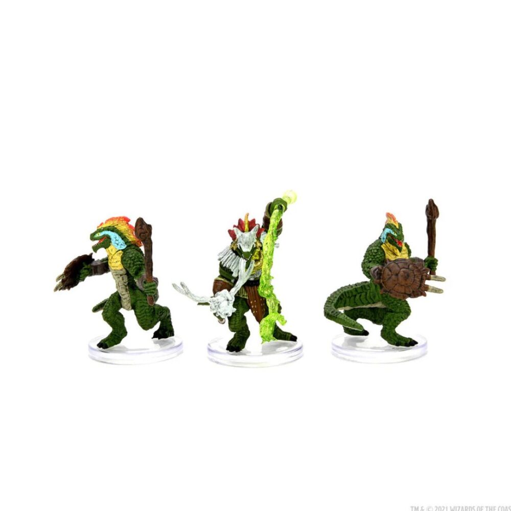 Image of three D&D Lizardfolk miniatures lined up from the front, with the Shaman in the middle flanked by two Warriors